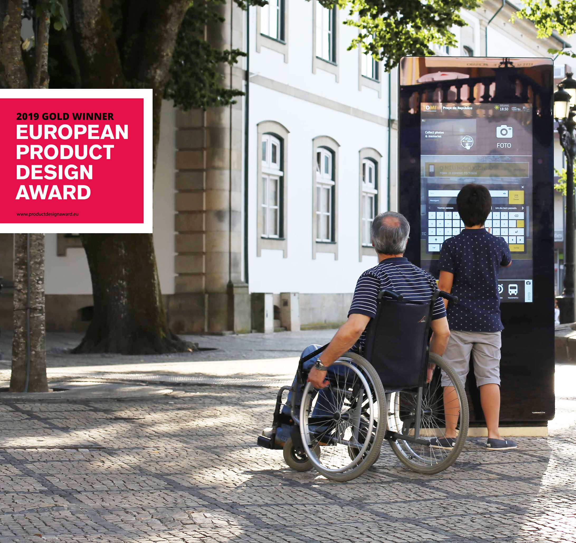 TOMI information screen with wheelchair user and young boy