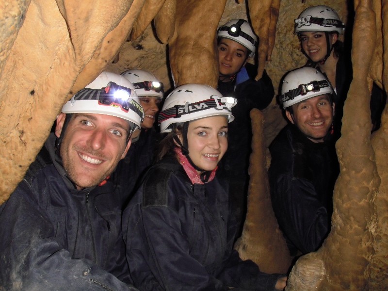 Image of 5 cavers in a cave