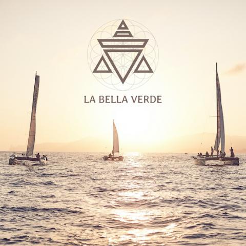 3 catermarans sailing at sunset and text La Bella Verde